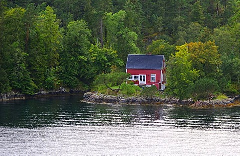 A typical Norwegian wooden house on the coast off Bergen, Norway, Scandinavia, Northern Europe