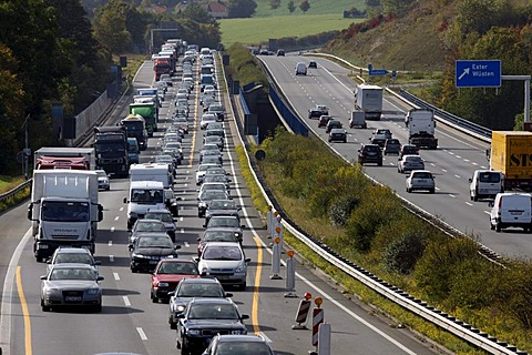 Traffic jam in the reduction of 3 to 2 lanes at a highway construction site on the A2 motorway, near Bielefeld, North Rhine-Westphalia, Germany, Europe