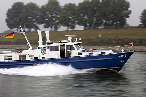 Boat of the water police patrolling on the Rhine river at Duisburg, North Rhine-Westphalia, Germany, Europe