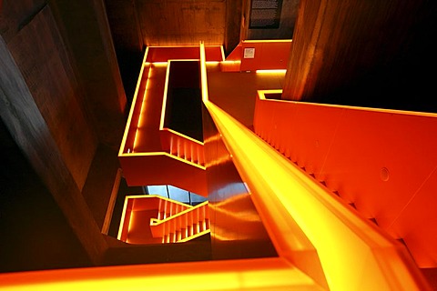 Red illuminated main staircase in the new Ruhrmuseum museum, opened in January 2010, Capital of Culture year, in the former coal washing plant of the Zeche Zollverein mine, World Heritage Site, Essen, North Rhine-Westphalia, Germany, Europe