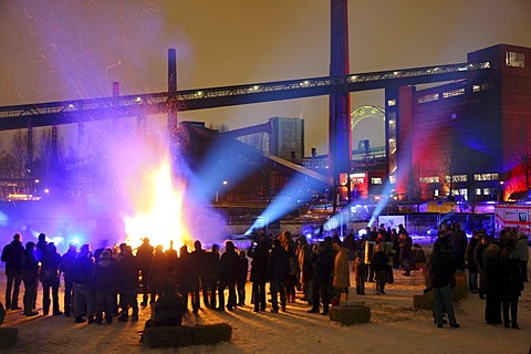 Bonfire against the backdrop of the Kokerei Zollverein coking plant, with different light and fire installations at the GlueckAuf2010 cultural festival at the start of the European Capital of Culture year, on the site of the Zeche Zollverein mine and coki