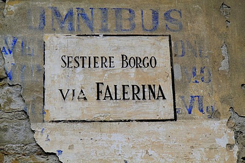 Street sign, Sestiere Borgo Via Falerina, painted on a wall over faded blue painted lettering, Omnibus, in the historic town centre of Ventimiglia, province of Imperia, Liguria region, Riviera dei Fiori, Mediterranean Sea, Italy, Europe