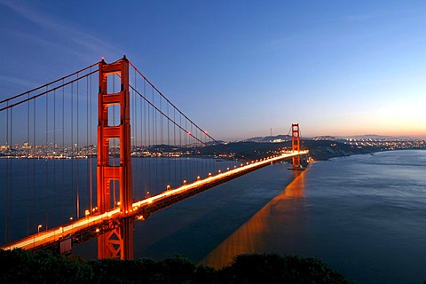 Illuminated Golden Gate Bridge at twilight, San Francisco Bay, California, United States of America