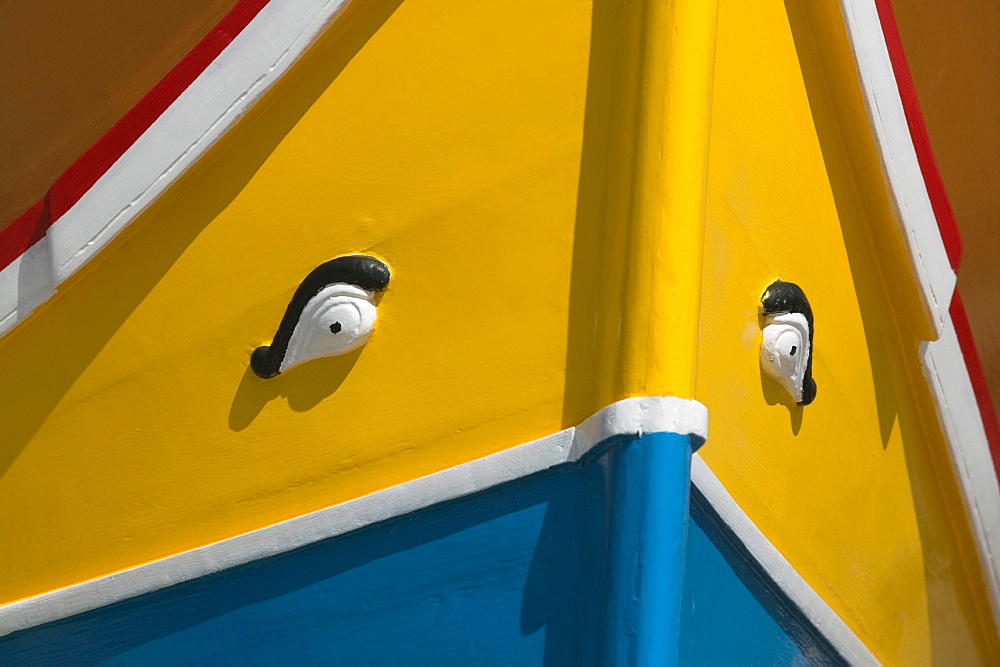 Close up of eyes on traditional wooden Maltese fishing boat, Luzzu, Marsaxlokk, Malta, Europe