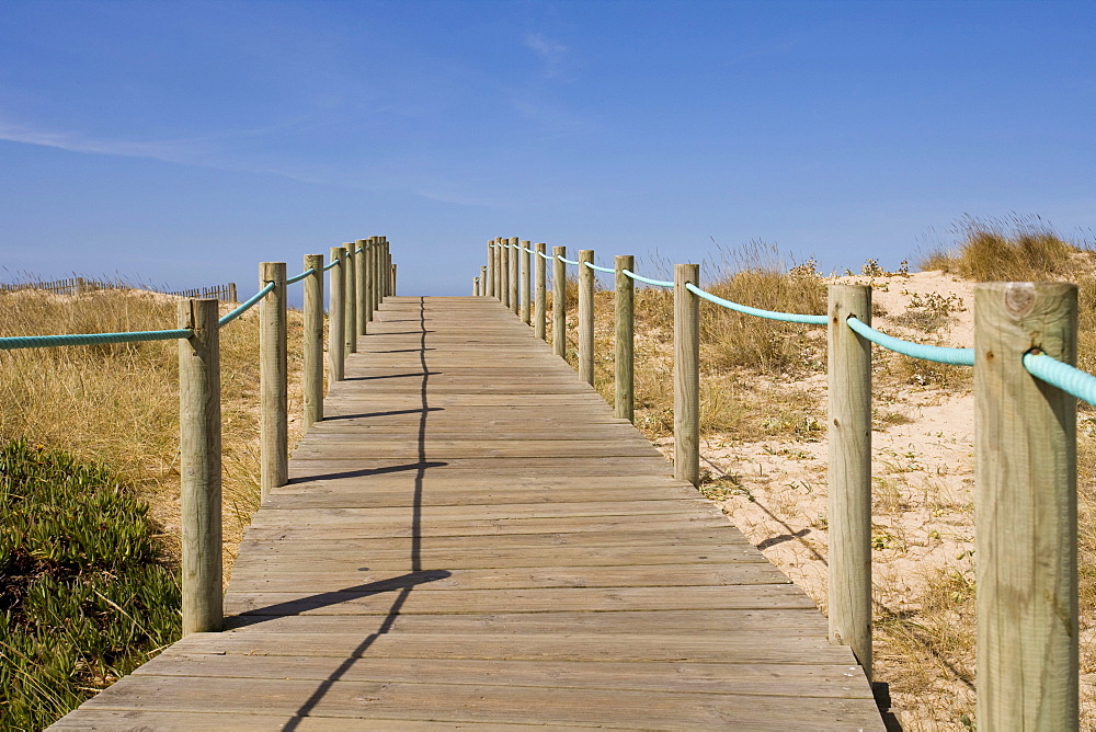 Wooden way in the beach