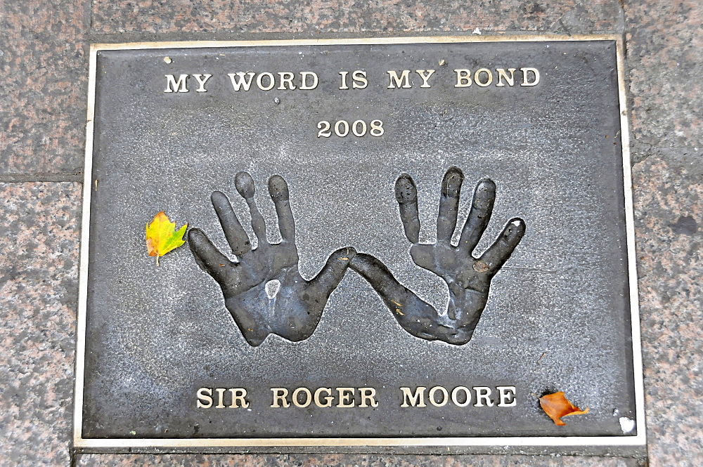 Sir Roger Moore, plaque with palm prints, Leicester Square, London, England, United Kingdom, Europe