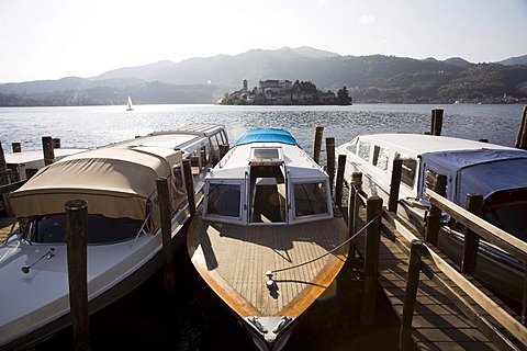 Orta San Giulio, Lago d'Orta, motorboats departing to the island of San Giulio, pilgrims destination, Novara, Piedmont, Italy, Europe