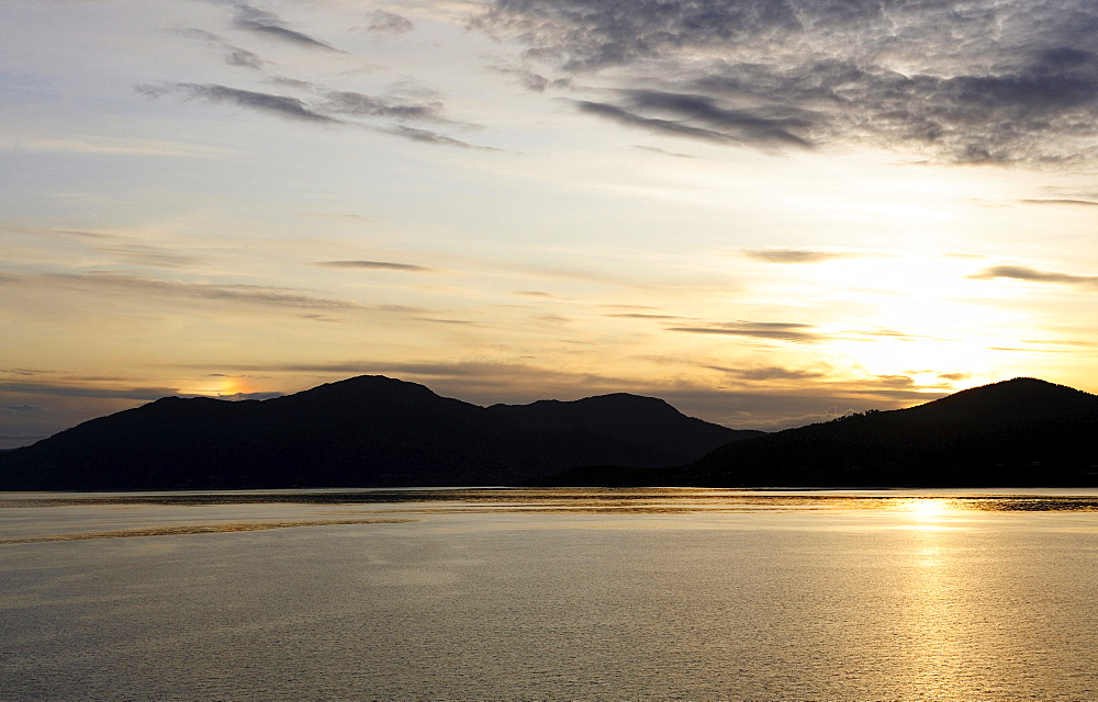 Sunset at the entrance of the Geirangerfjord, Norway, Scandinavia, Northern Europe, Europe