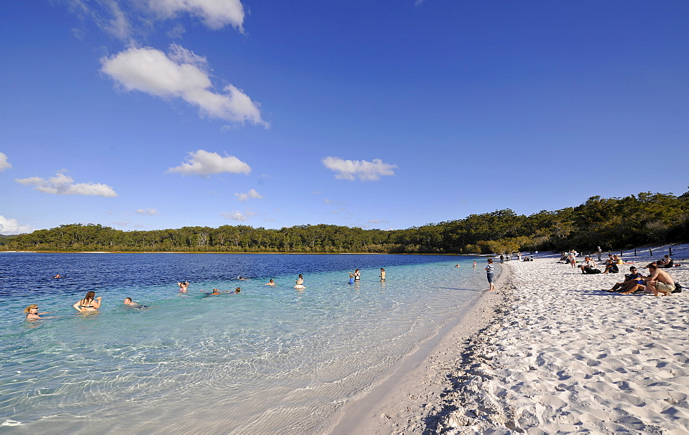 Tourists swimming in Lake McKenzie, UNESCO World Natural Heritage Site, Fraser Island, Great Sandy National Park, Queensland, Australia