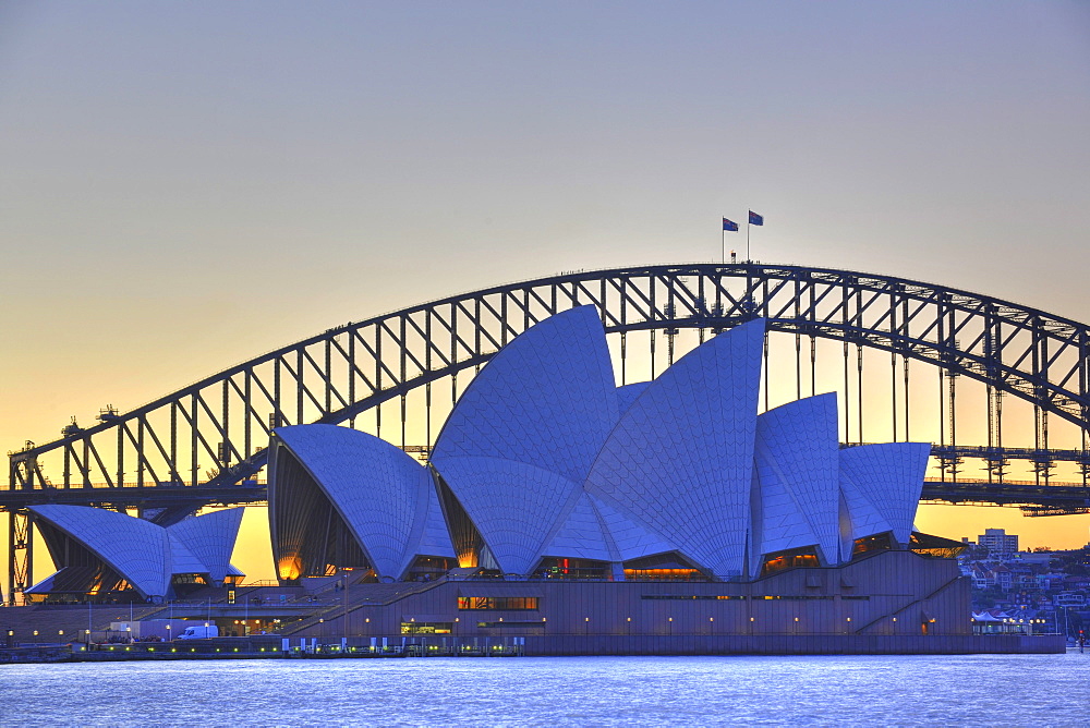 Sydney Opera House, Sydney Harbor Bridge at sunset, Sydney, New South Wales, Australia