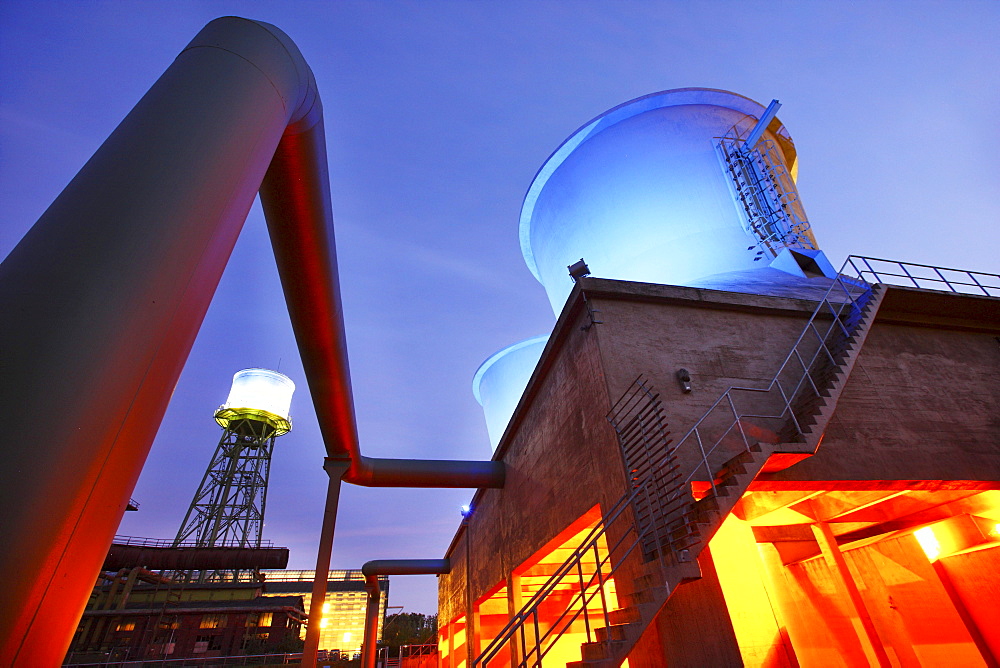 Illuminated cooling towers, water park in Westpark Industrial Park at Centennial Hall, Bochum, North Rhine-Westphalia, Germany, Europe