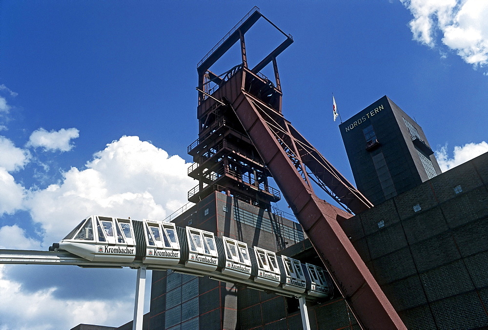 Opening Nordsternpark park, Bundesgartenschau Federal Garden Show 1997, elevated train driving in front of shaft tower, Gelsenkirchen, Ruhr area, North Rhine-Westphalia, Germany, Europe