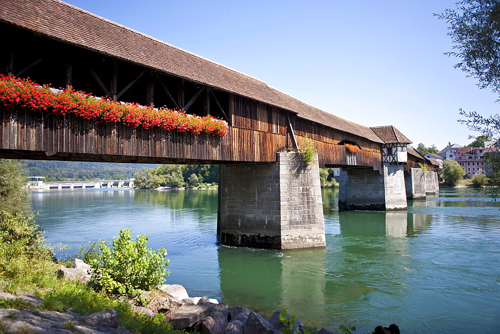 Old covered wooden bridge dating from the 15th Century over the Rhine River, Bad Saeckingen, Waldshut district, Baden-Wuerttemberg, Germany, Europe