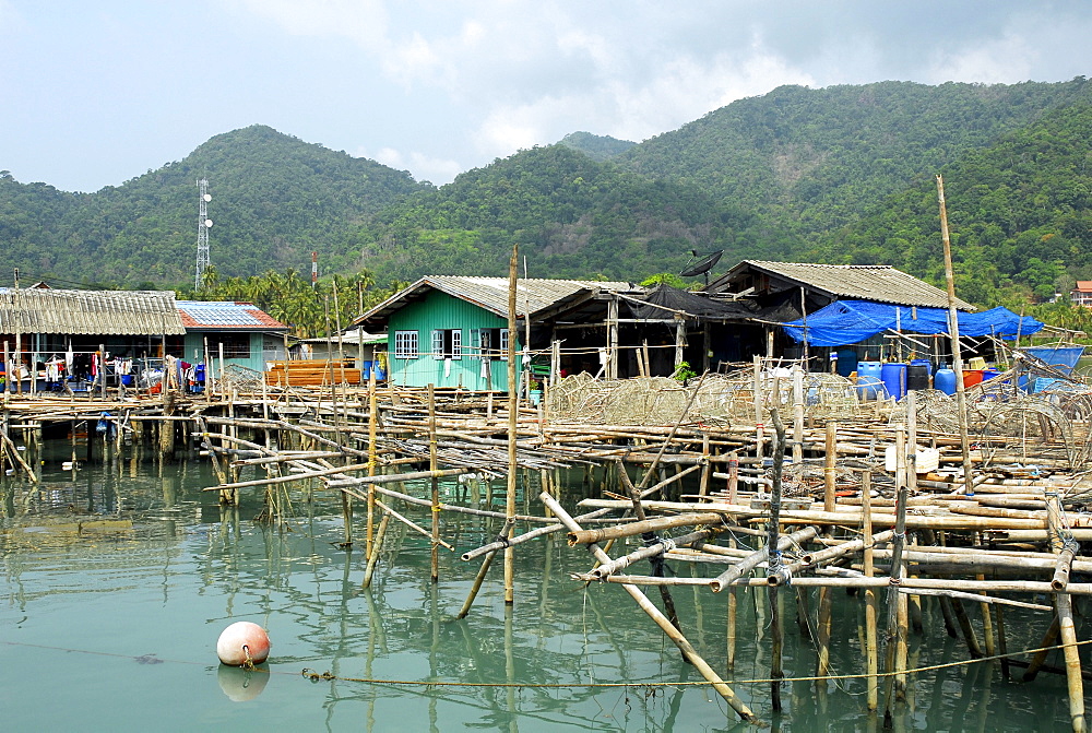 Pier with housing in the Bang Bao bay, Koh Chang Island, National Park Mu Ko Chang, Trat, Gulf of Thailand, Thailand, Asia