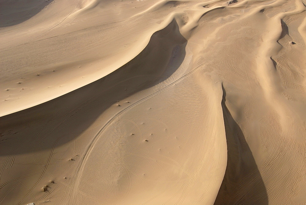 Aerial view of sand dunes in the Gobi desert with caravan route, Silk Road, Dunhuang, Gansu, China, Asia