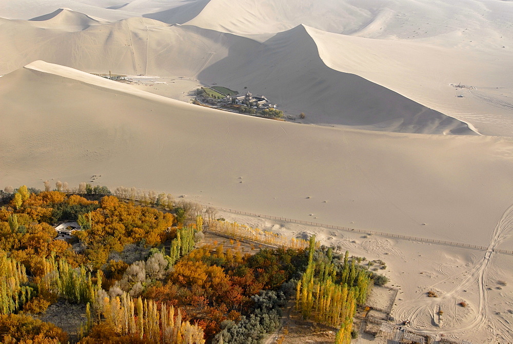 Aerial view of Crescent Lake and the giant sand dunes in the Gobi Desert, Silk Road, Dunhuang, in Gansu, China, Asia