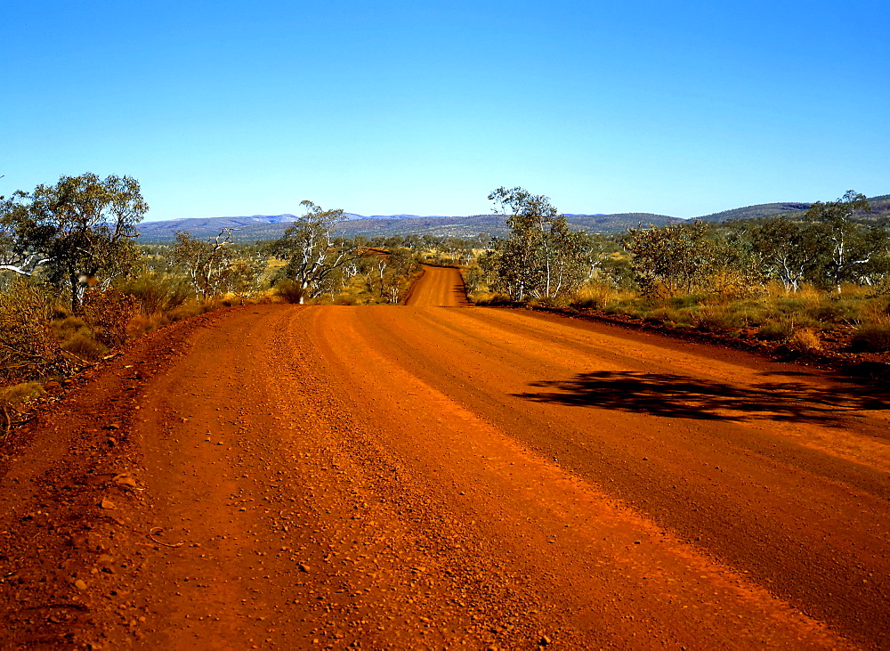 Red dirt gravel road, outback, Northwest Australia