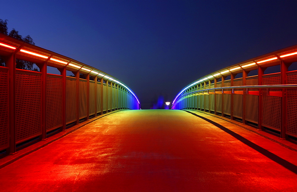 Bridge with rainbow-coloured lighting over the federal road 1, Highway 40, Dortmund, Ruhr area, North Rhine-Westphalia, Germany, Europe