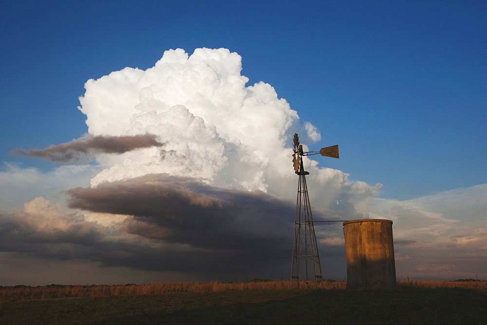 Wind mill with thunder cloud, Sinton, Corpus Christi, Coastal Bend, Texas, USA