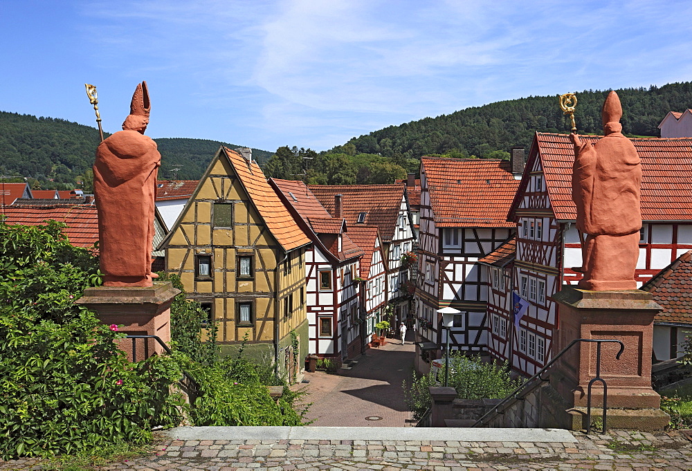 Bishop statues on the church steps of St Martin's Church, Bad Orb, Main-Kinzig district, Hesse, Germany, Europe