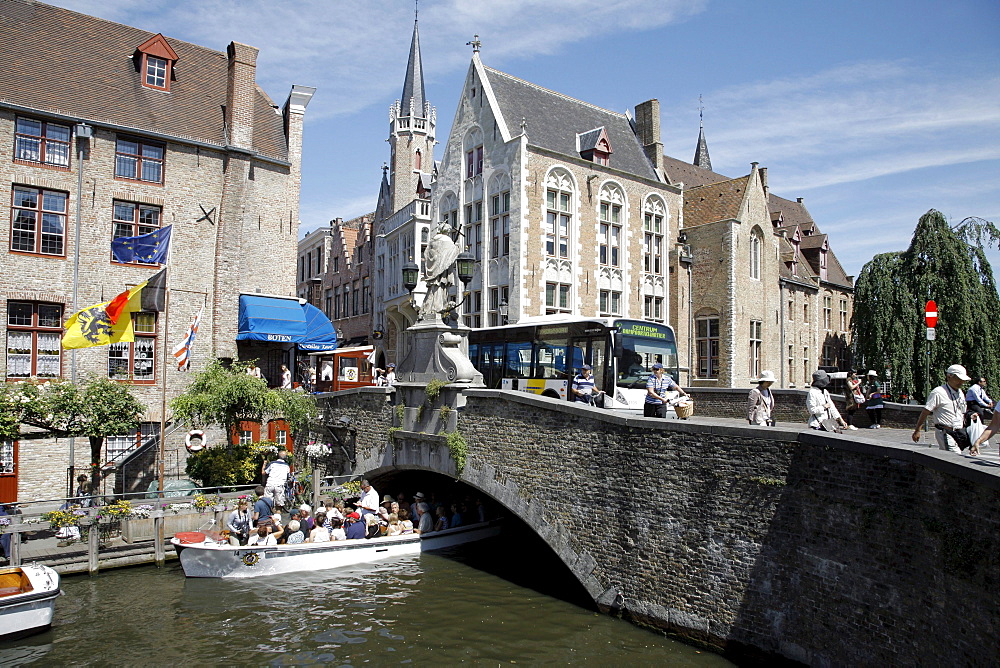 Mooring for boat tours through canals, historic center of Bruges, Flanders, Belgium, Europe