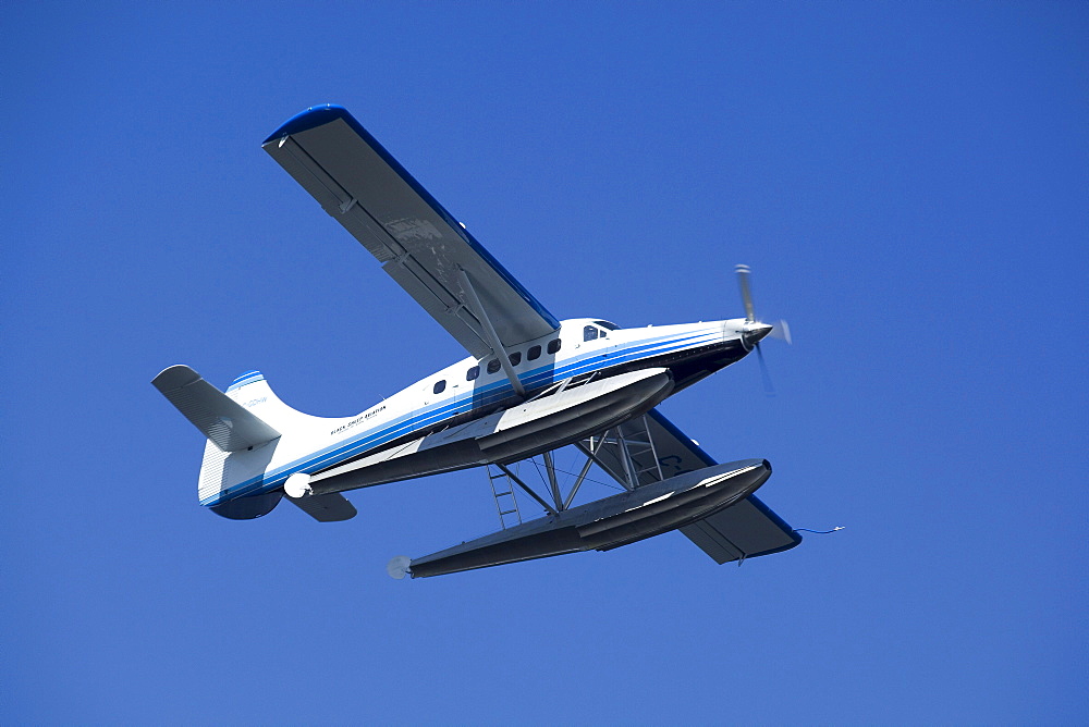 Flying de Havilland Canada DHC-3 Otter, Floatplane, bush plane, Caribou Lakes, upper Liard River, Yukon Territory, Canada