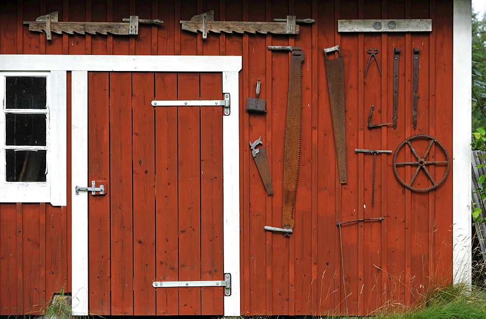 Wooden shed with old tools at Skoerde, Vaestergoetland, Sweden, Europe