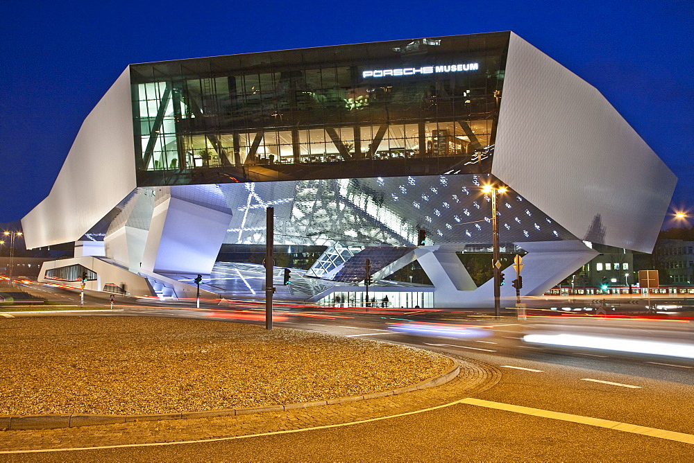 Porsche Museum in Stuttgart-Zuffenhausen, car museum, modern architecture, illuminated in the evening, opening in 2009, Stuttgart, Baden-Wuerttemberg, Germany, Europe