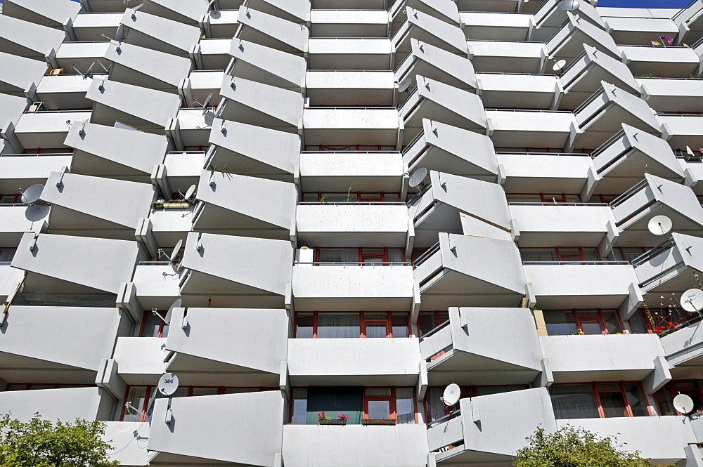 High-rise apartment building with balconies and satellite dishes, satellite town of Chorweiler in Cologne, North Rhine-Westphalia, Germany, Europe