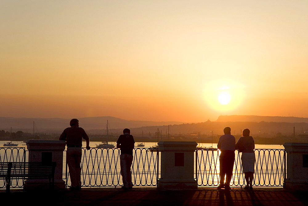 Sunset, view from Ortigia island, the old town of Syracuse, Sicily, Italy, Europe