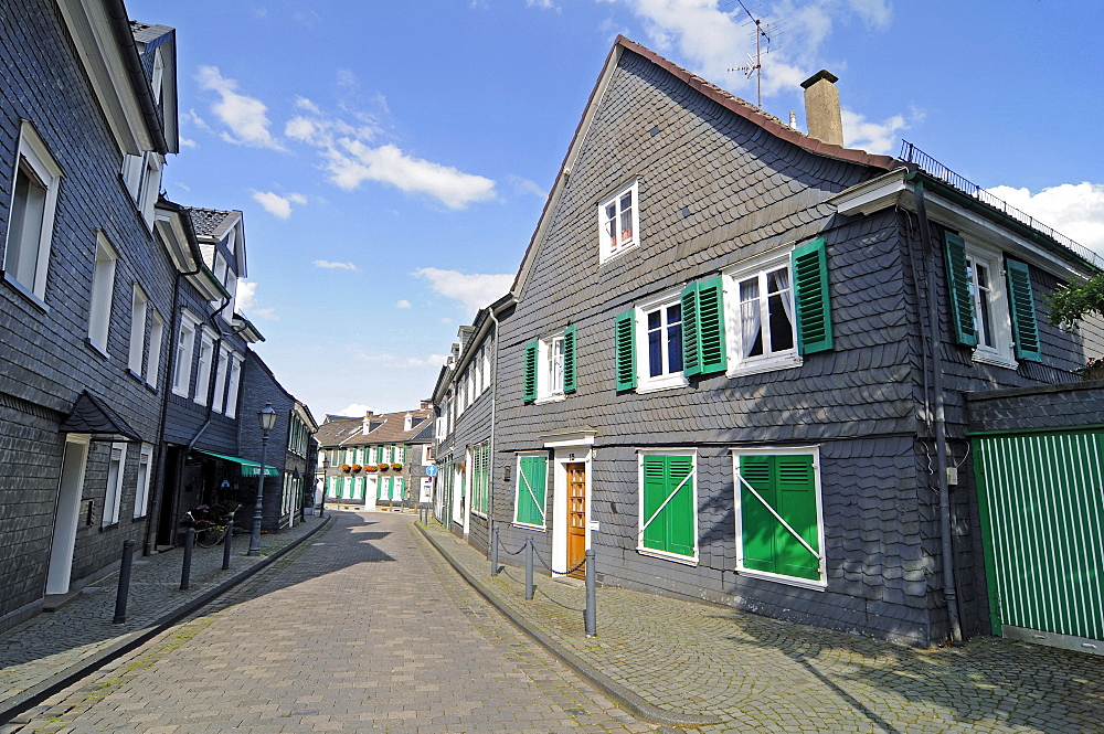 Half-timbered houses, slate cladding, street, historic centre, Hueckeswagen, Bergisches Land area, North Rhine-Westphalia, Germany, Europe