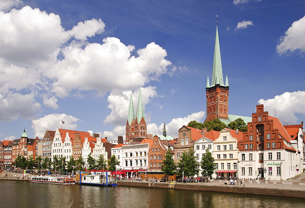 At the upper Trave river, in the back the churches of St. Petri and Marienkirche, St. Mary's of Luebeck, Luebeck, Schleswig-Holstein, Germany, Europe