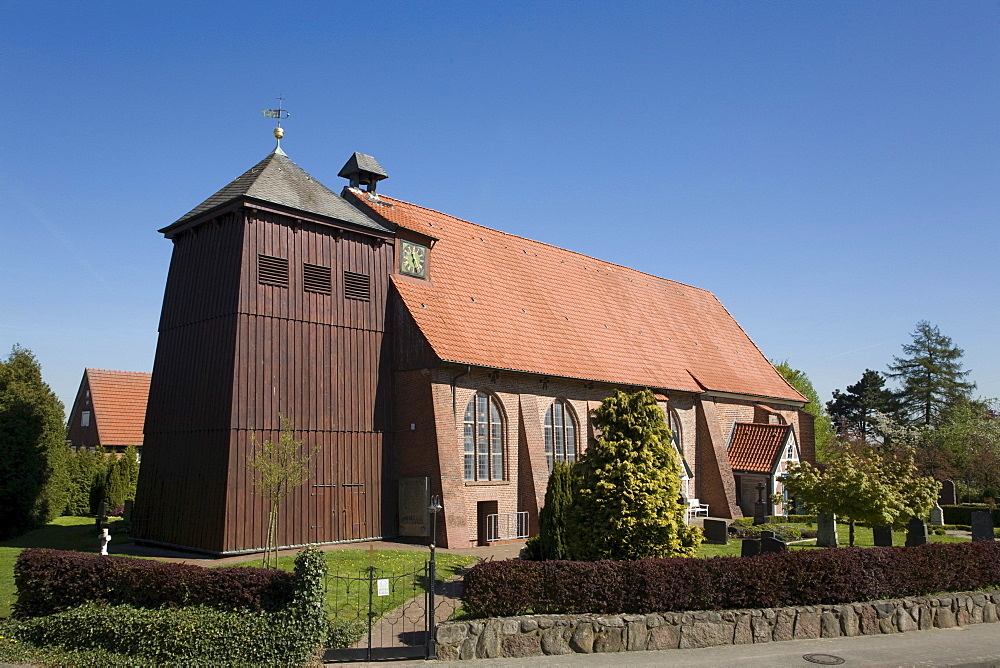 St Bartholomaeus Kirche St Bartholomew's Church in Mittelnkirchen, cherry blossom, Altes Land region, Lower Elbe, Lower Saxony, North Germany, Germany, Europe