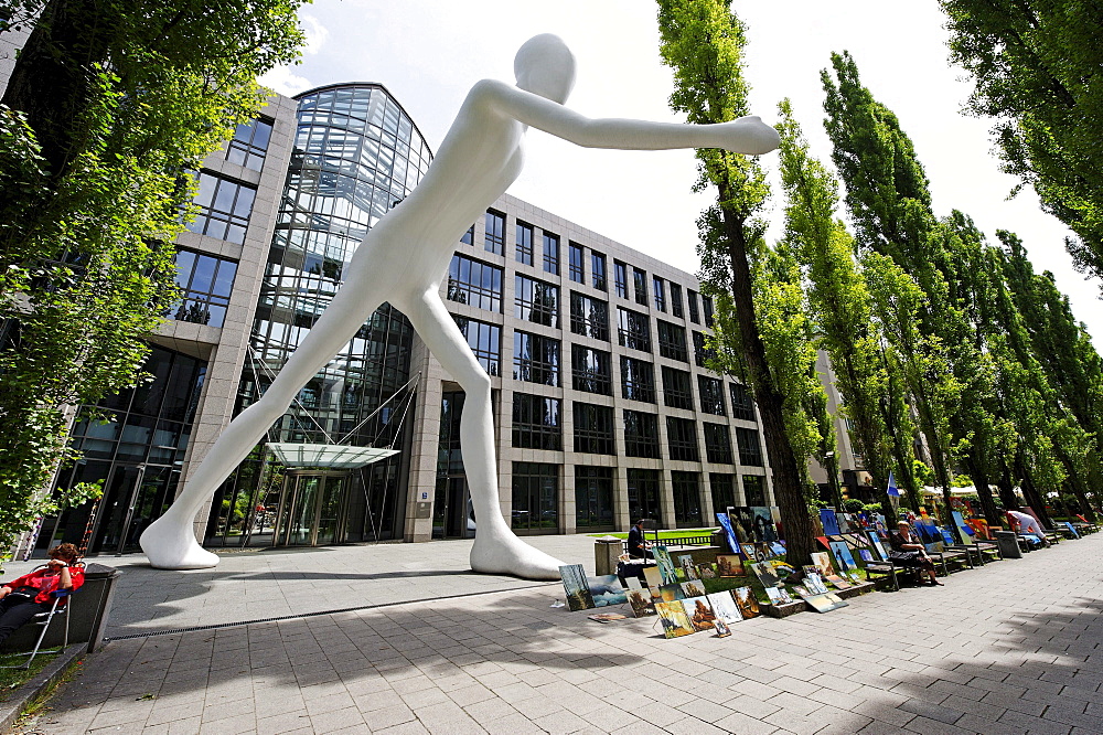 Walking Man, sculpture by Jonathan Borofsky, 1995, in front of the building of the Muenchener Rueckversicherung insurance company, Leopoldstrasse street, Schwabing, Munich, Upper Bavaria, Germany, Europe