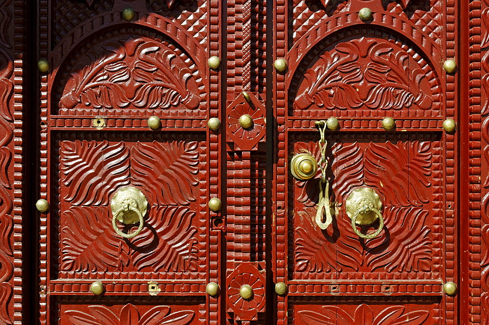 Historic carved wooden door in Sur, Sharqiya Region, Sultanate of Oman, Arabia, Middle East