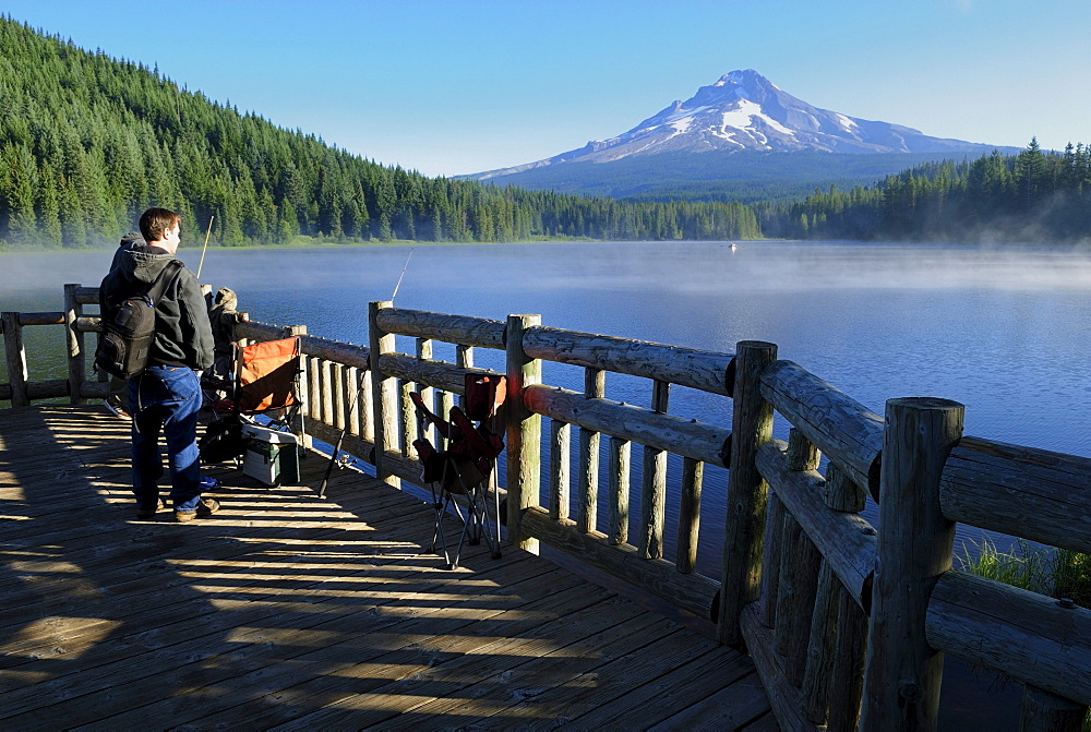 Anglers at Trillium Lake with Mount Hood volcano, Cascade Range, Oregon, USA