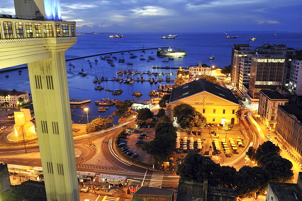 View of the lower city Cidade Baixa and lift Elevador Lacerda at night, Salvador, Bahia, UNESCO World Heritage Site, Brazil, South America