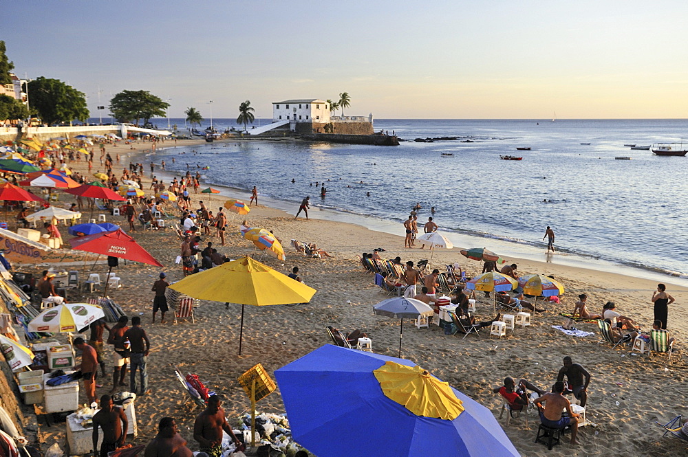 Lively beach of Porto da Barra and Forte Santa Maria fortress, Salvador, Bahia, Brazil, South America