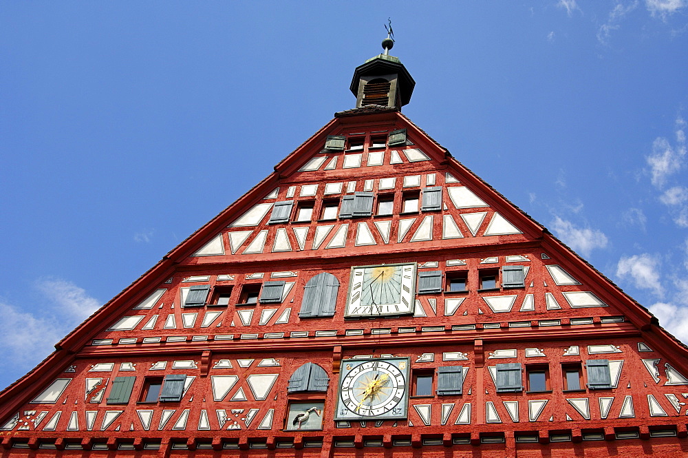 Half-timbered gable of the historial town hall of Grossbottwar with clock, sun dial and stork as heraldic animal, Grossbottwar, Baden-Wuerttemberg, Germany, Europe