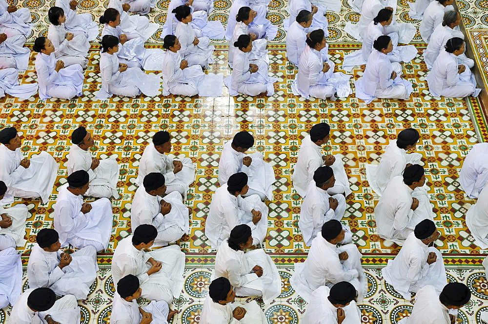 Ceremonial midday prayer in the Cao Dai temple, Tay Ninh, Vietnam, Asia