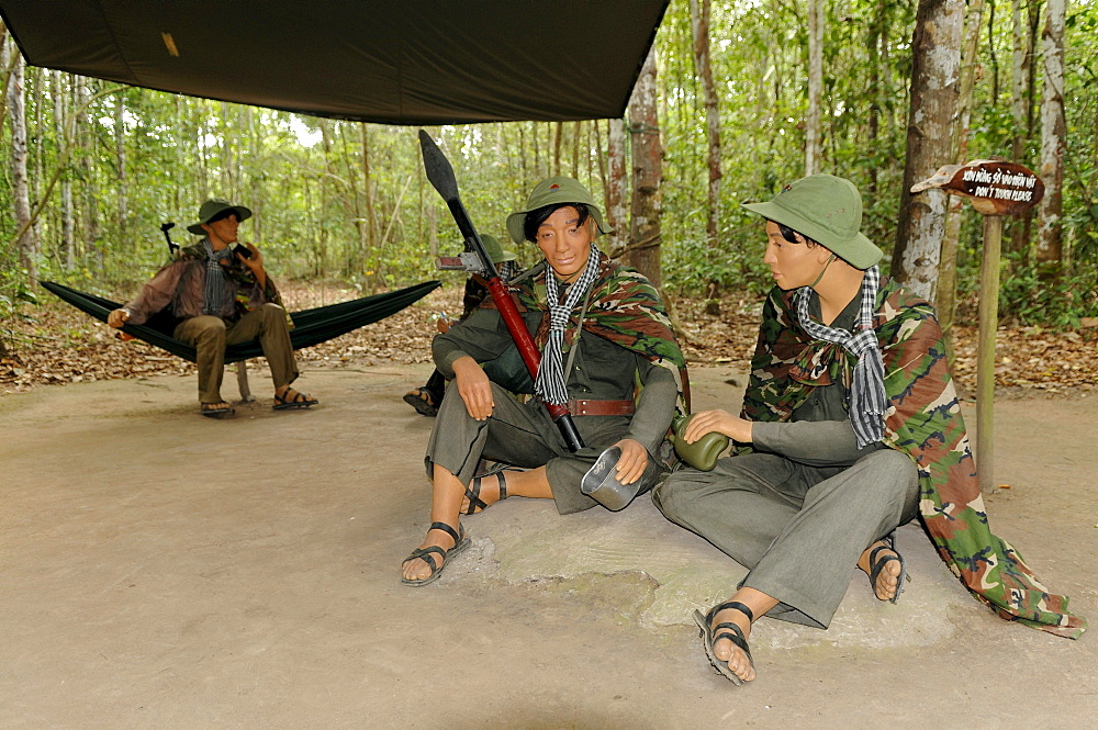 Dolls, armed Vietnamese soldiers sitting in a jungle camp, Cu Chi caves, Vietnam, Southeast Asia