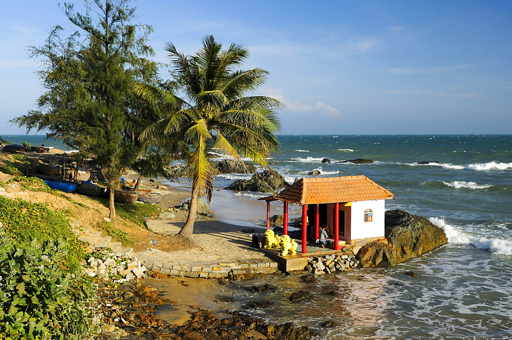 Small temple shrine on the beach at Mui Ne, Vietnam, Asia