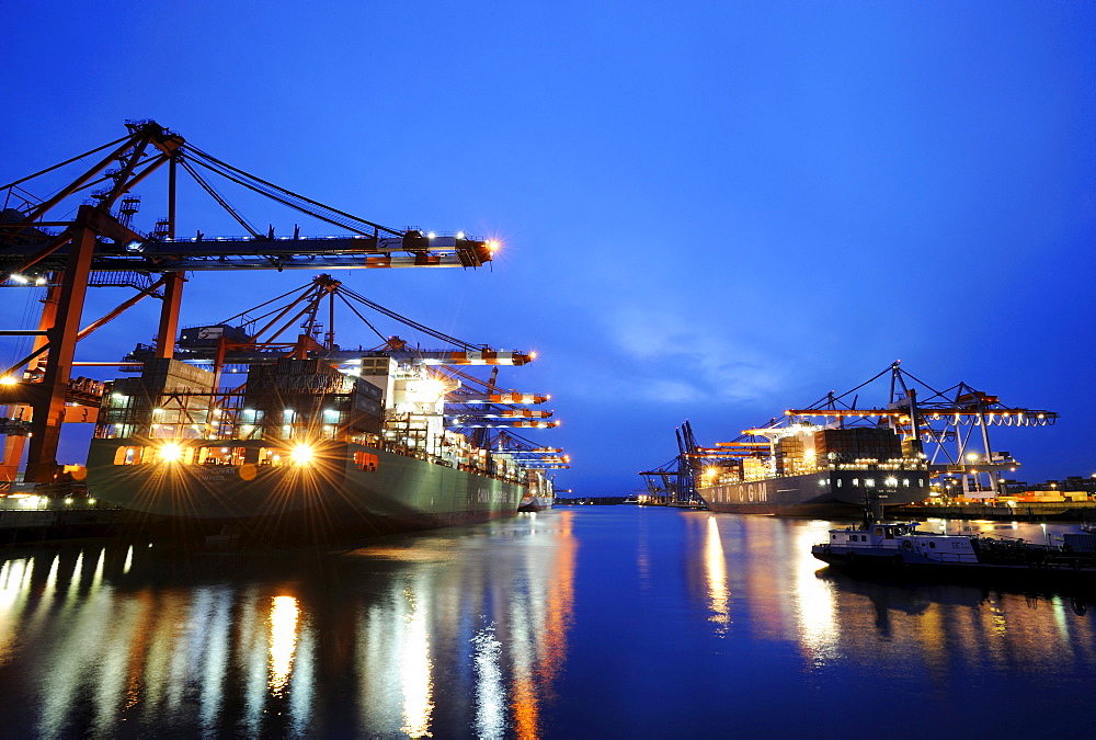 Loading a container ship at the Eurogate terminal, Hamburg, Germany, Europe