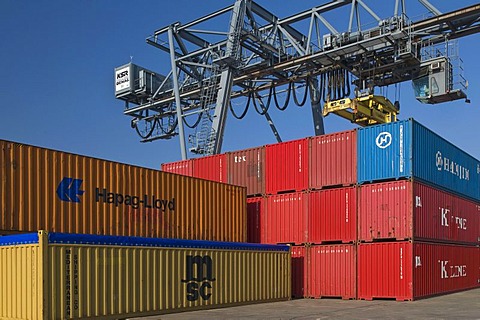 Containerterminal Bonn, stacked 40 feet ISO freight container in crane runway, gantry crane at back, North Rhine-Westphalia, Germany, Europe