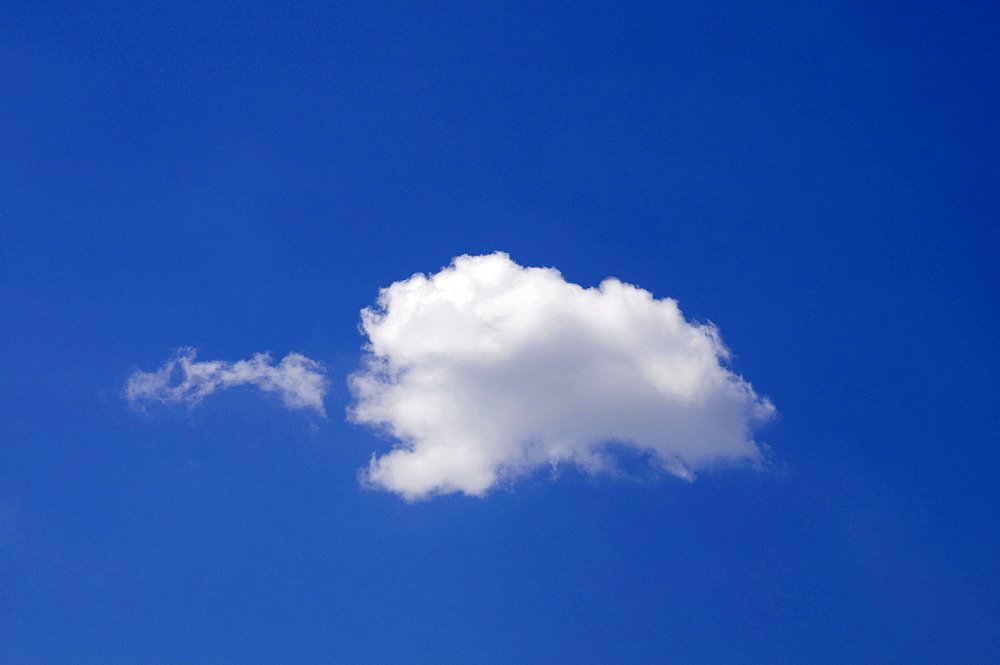 Cumulus cloud with haze, in blue sky