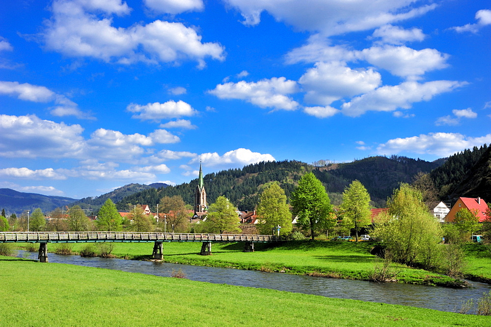 Kinzig river with city church of St. Mauritius, Hausach, Black Forest, Baden-Wuerttemberg, Germany, Europe