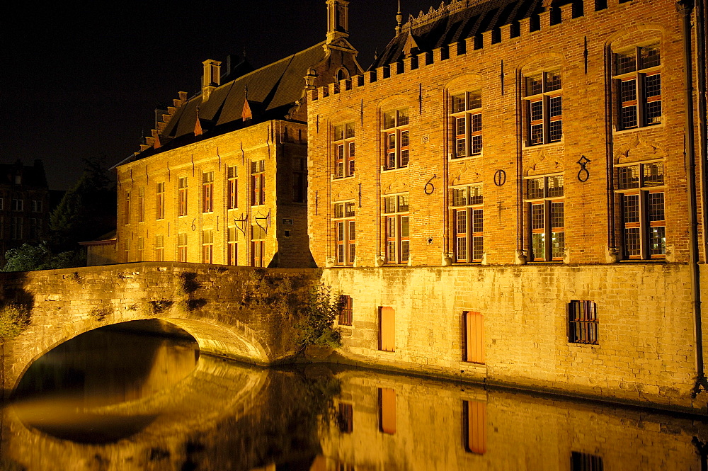 Water reflection, River Dijver, Bruges at night, Flanders, Belgium, Europe