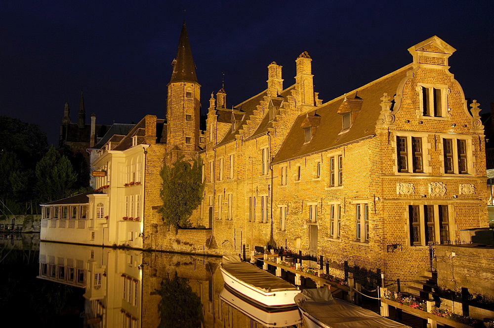 Water reflection on River Dijver at dusk, Bruges, Flanders, Belgium, Europe