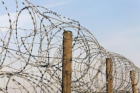 Fence, secured with NATO wire, barbed wire