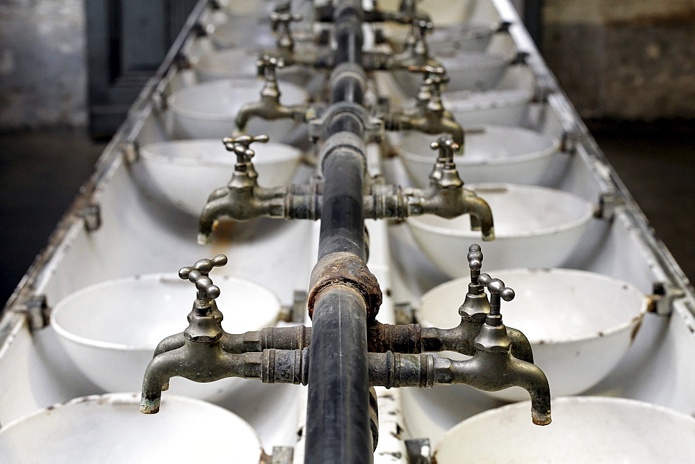 Old faucets, former washroom for workers, Hendrichs swage forge, LVR Industrial Museum, Solingen, North Rhine-Westphalia, Germany, Europe